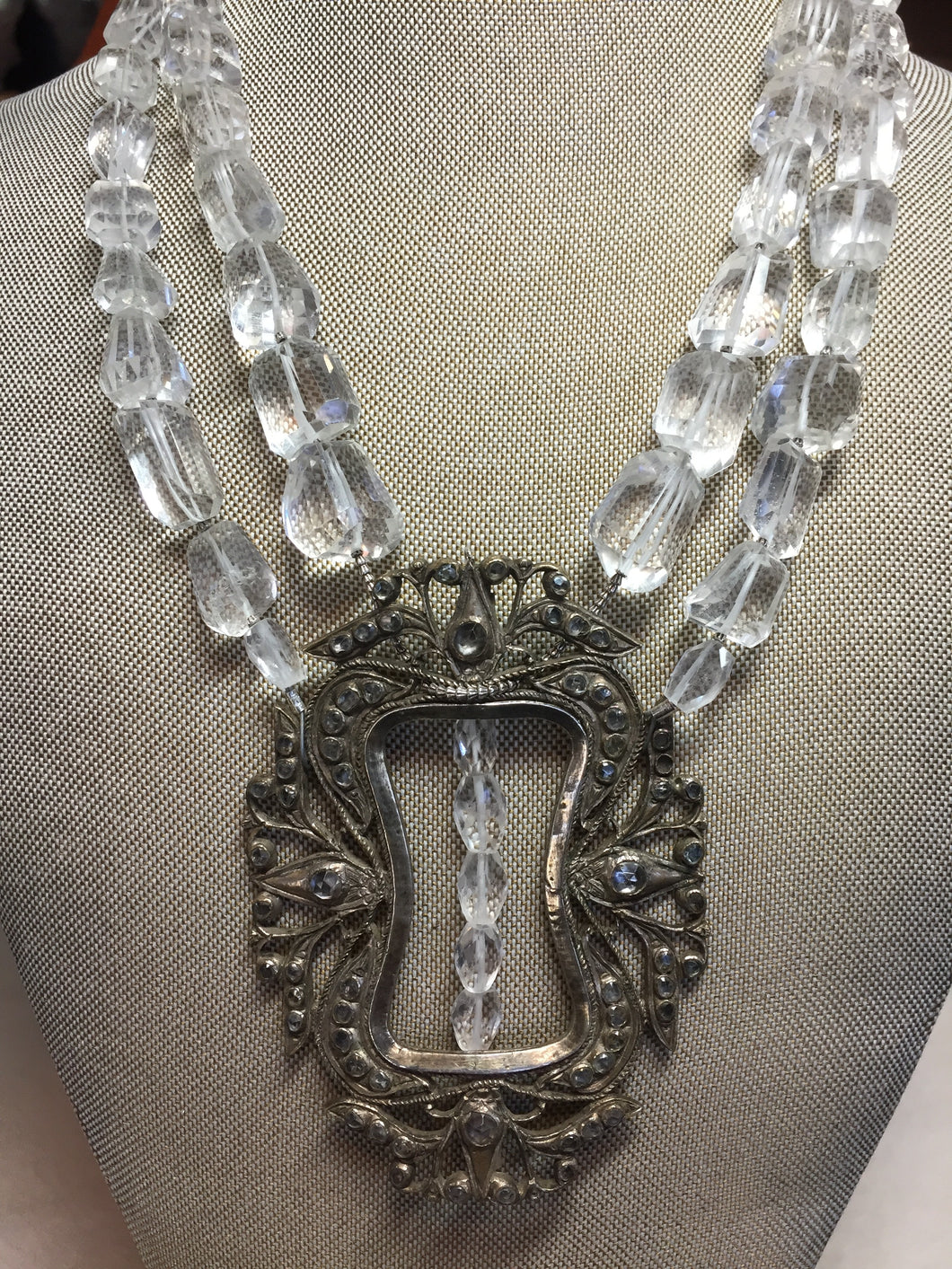 Antique Indonesian Belt Buckle on faceted crystal beads #9411